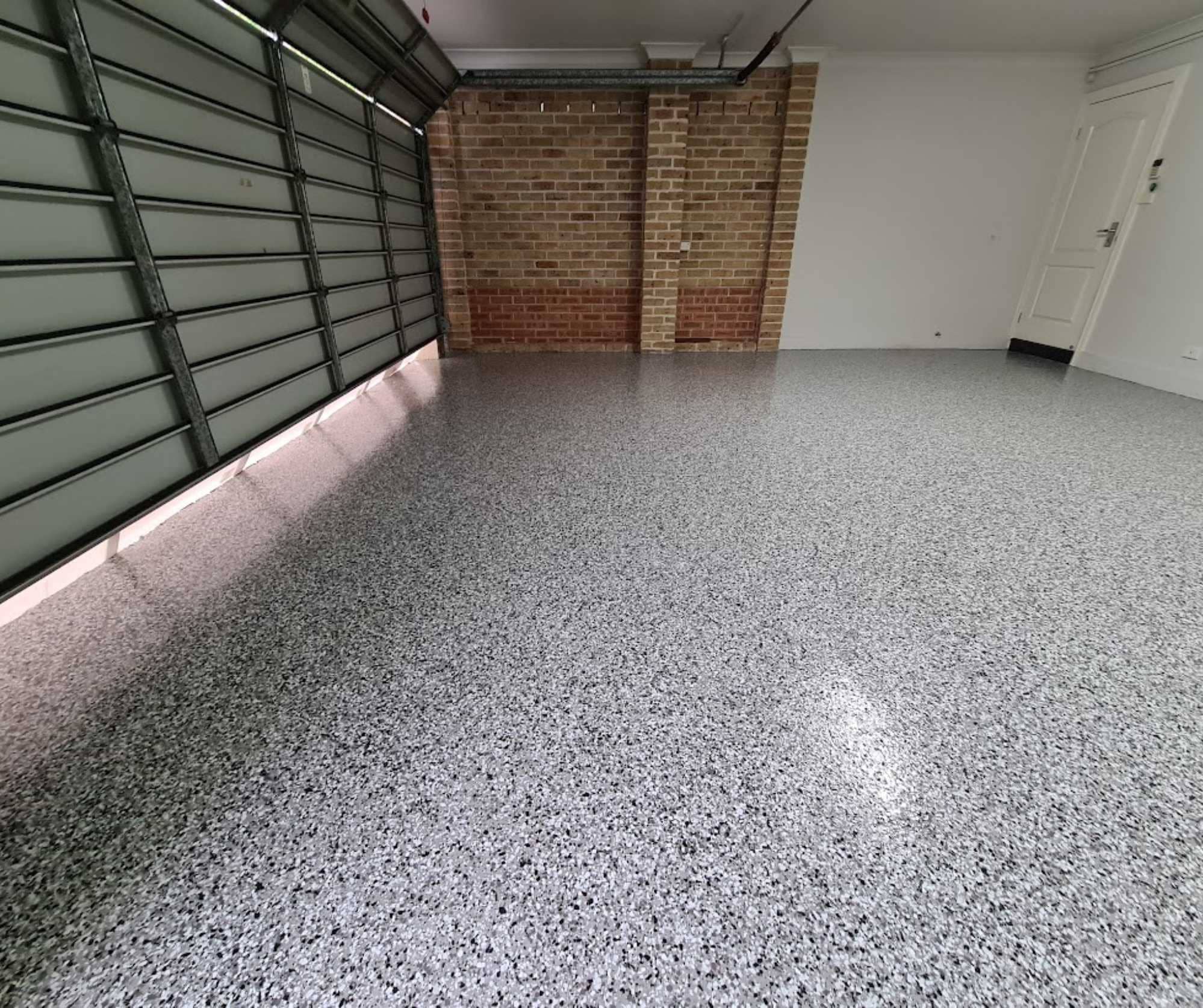 Full flake garage epoxy flooring in Sydney with grey decorative flake finish