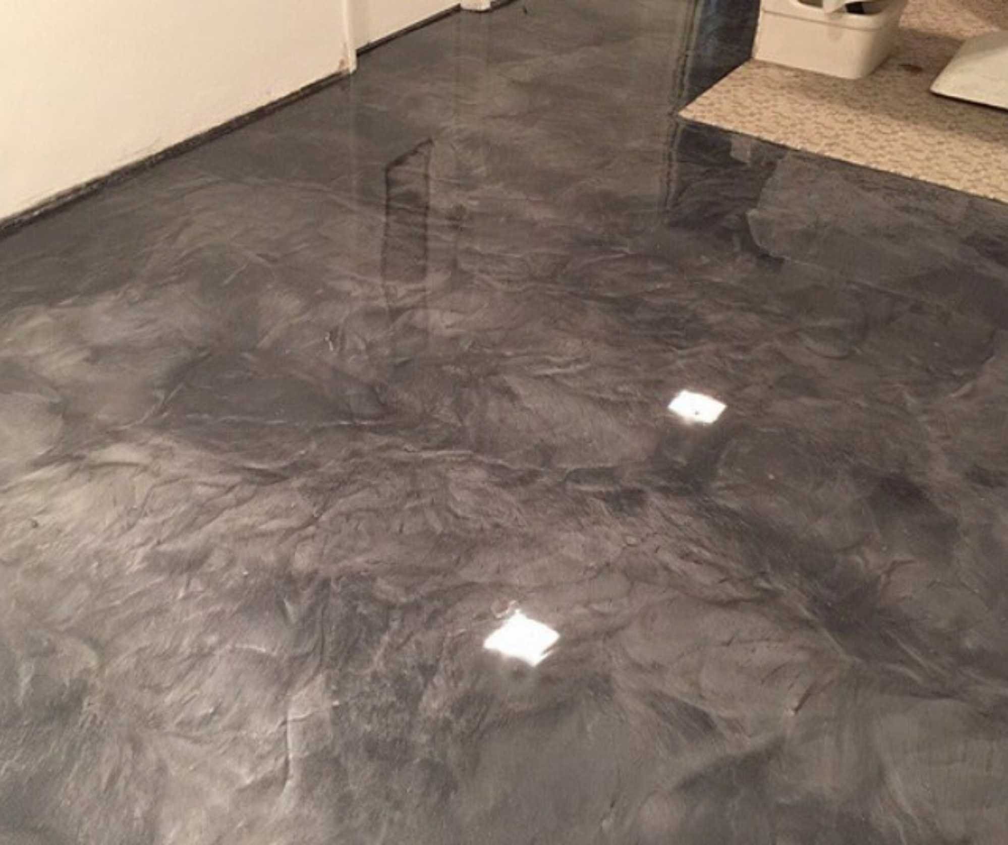 Metallic epoxy garage floor in Sydney with dark marble-style finish
