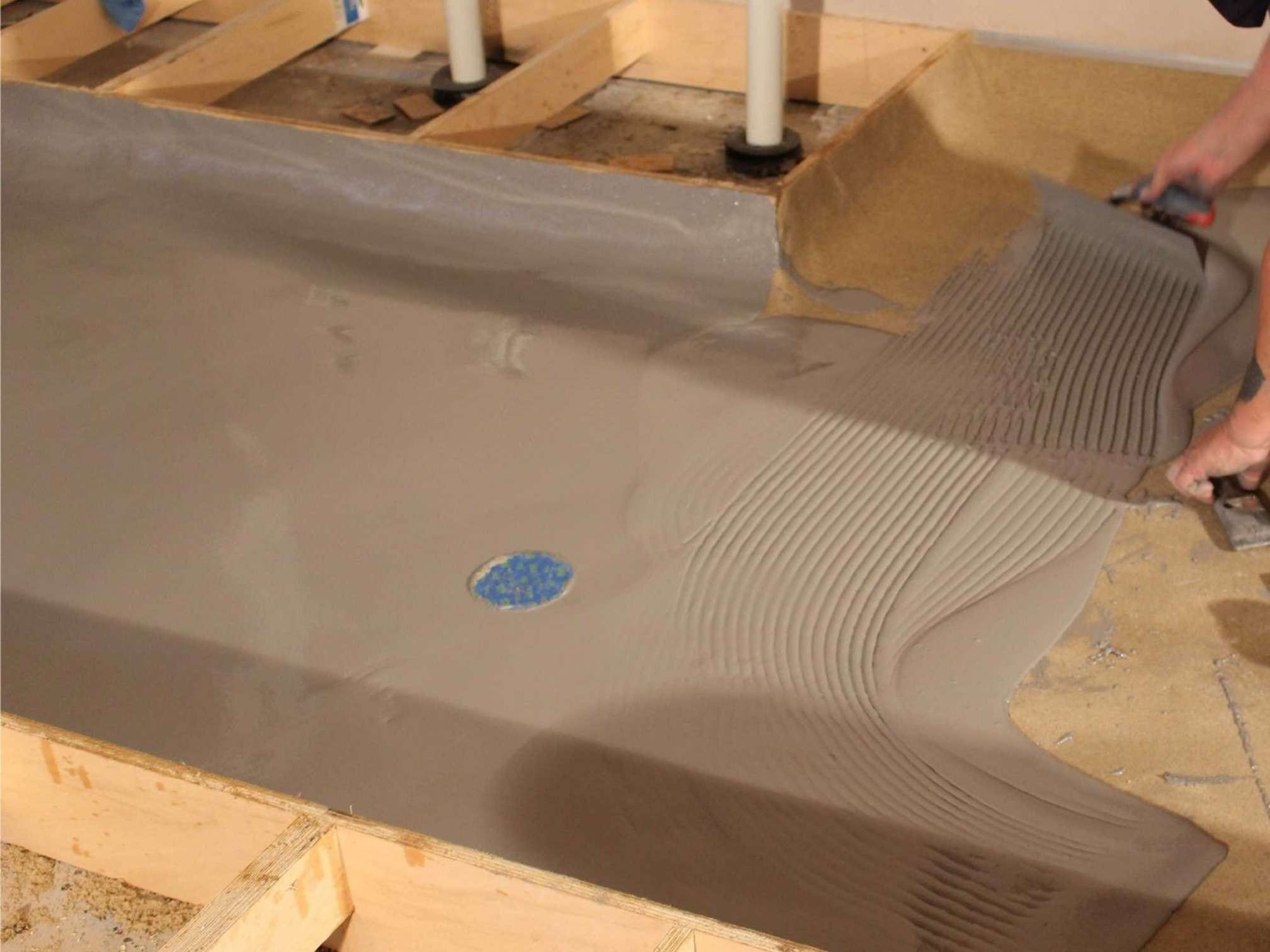 Commercial kitchen fall-to-drain screed installation in Sydney